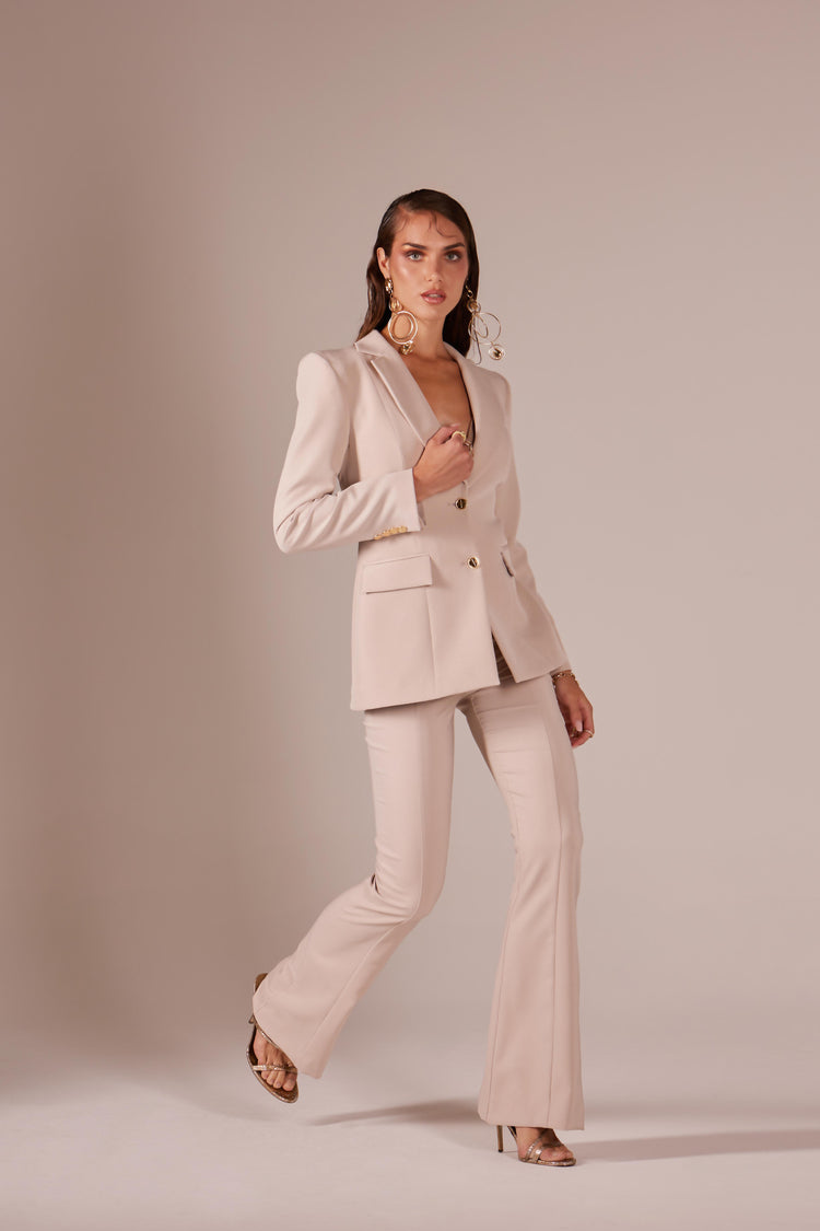 Single-breasted jacket in technical fabric with metal buttons