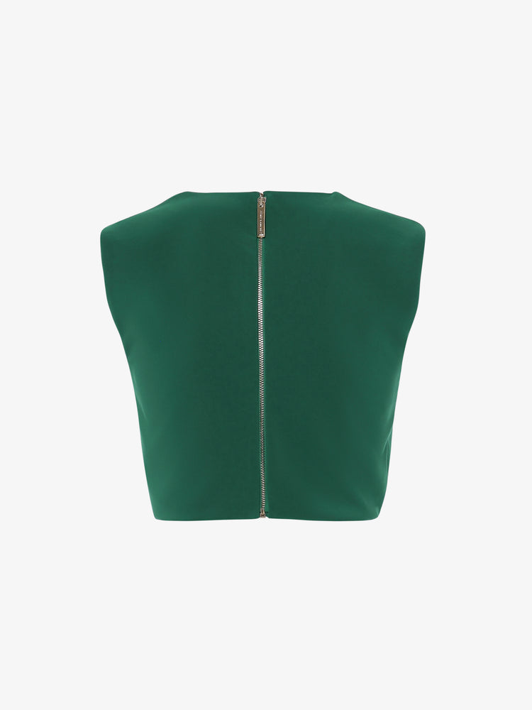 Short top in technical fabric with metal accessories on the shoulder straps