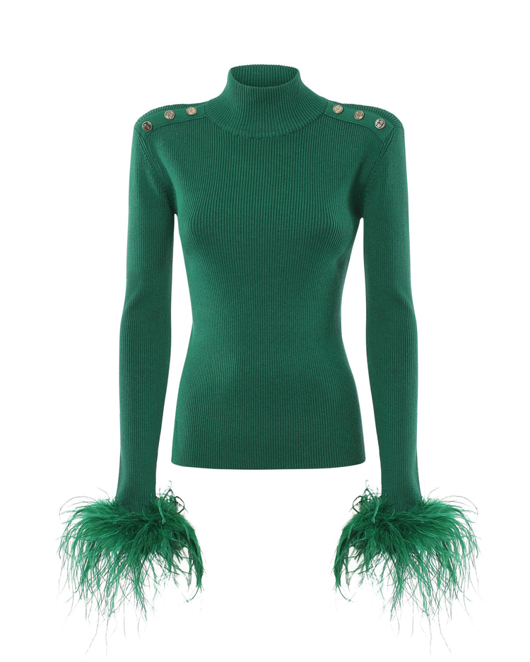 Maglia a collo alto con bottoni metallici e polsi piume