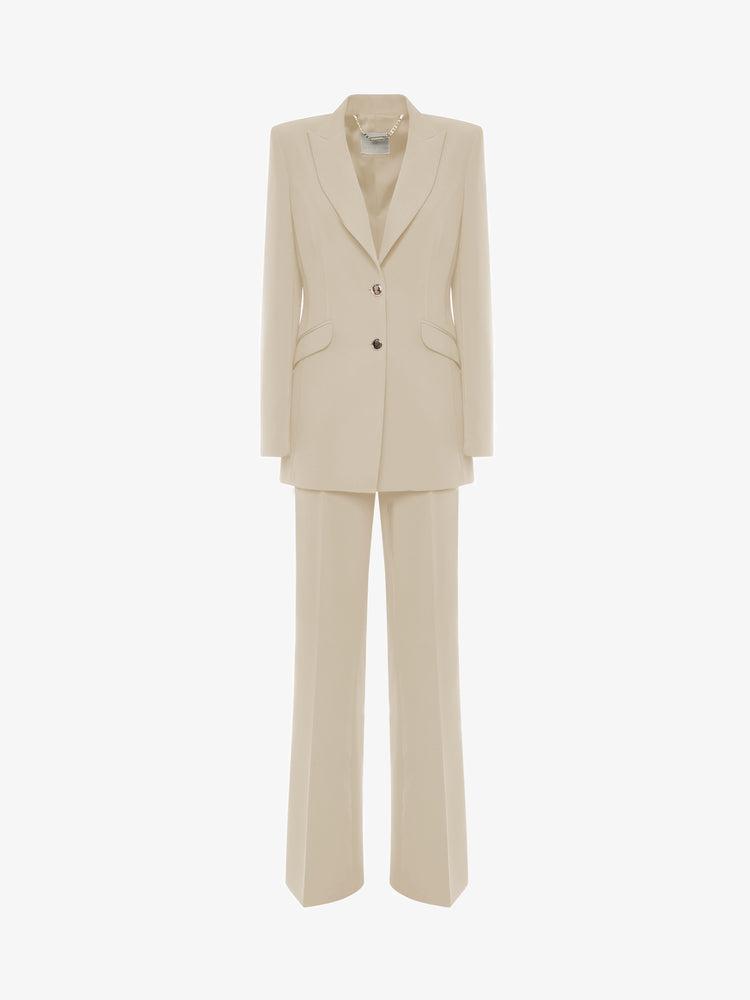 Single-breasted straight trouser suit in technical fabric with metal buttons