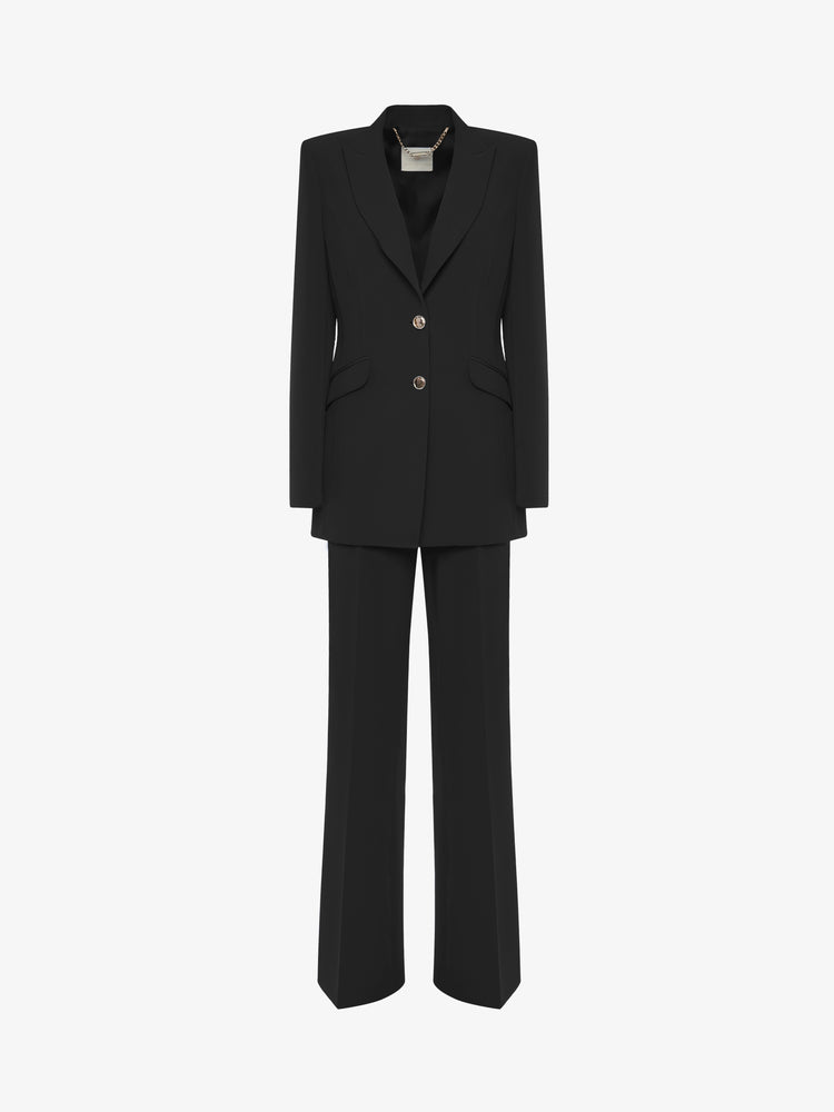 Single-breasted straight trouser suit in technical fabric with metal buttons