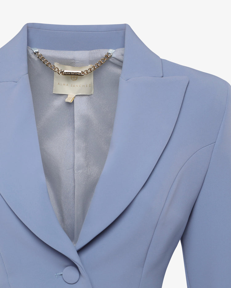 Giacca cropped in crêpe con applicazioni in vetro