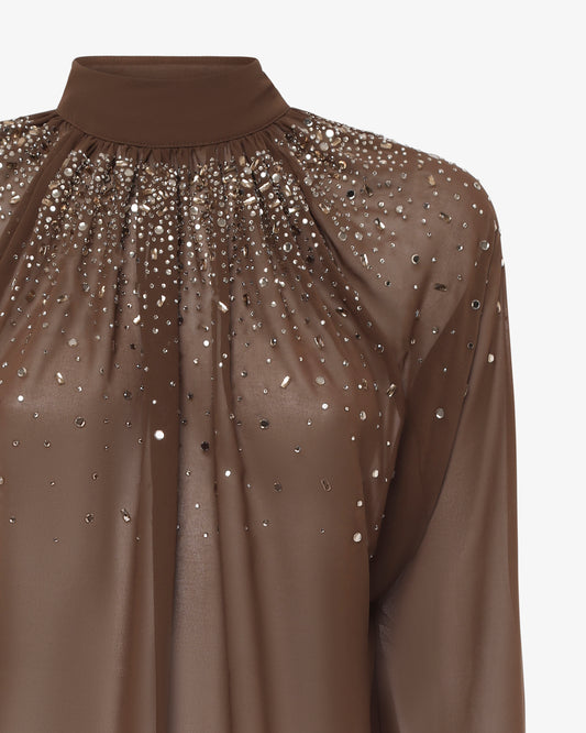 Blusa in georgette collo alto con applicazioni in strass