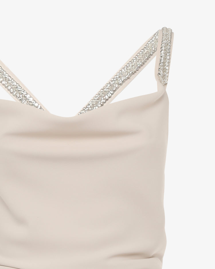 Abito lungo in tessuto fluido con spalline gioiello incrociate e schiena scoperta