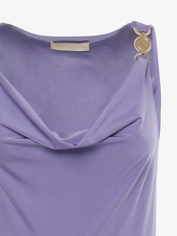 Jersey top with soft neckline and metallic decorations