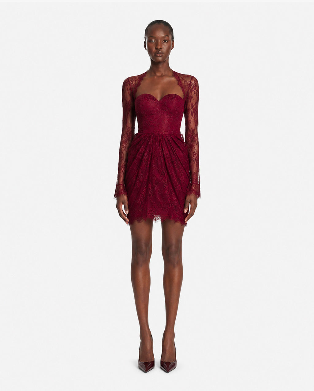 Abito mini in pizzo con scollo a cuore