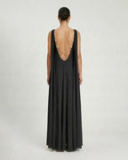 Abito lungo in georgette svasato con accessorio gioiello schiena