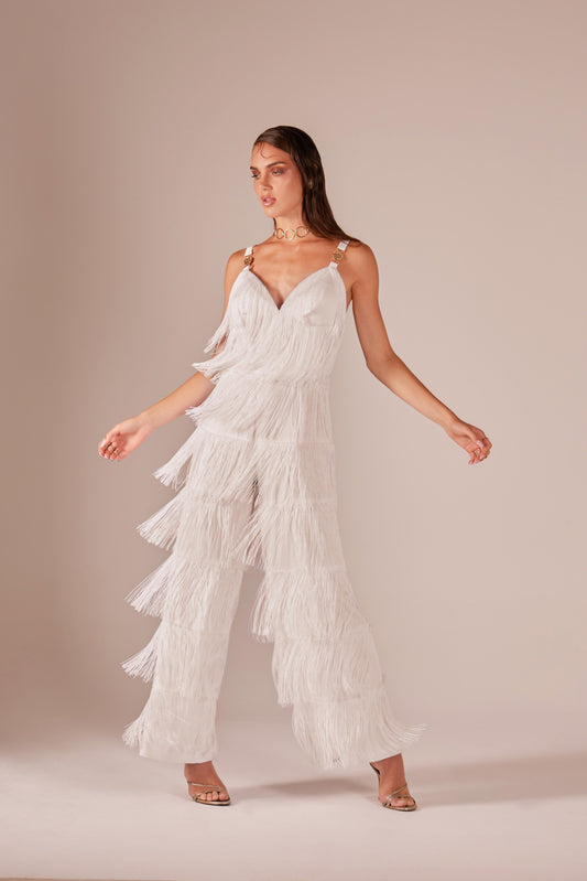 Satin jumpsuit with fringes and shoulder straps with metallic decorations