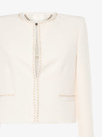 Short jacket in technical edge fabric with jewel applications