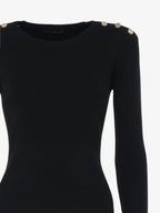 Crewneck sweater with metal buttons