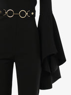 Technical fabric jumpsuit with ruffle sleeves and metal accessory at the waist