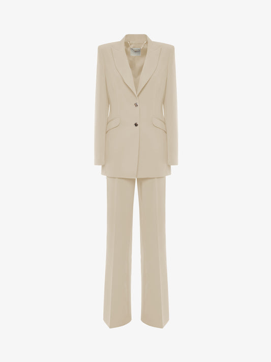 Single-breasted straight trouser suit in technical fabric with metal buttons