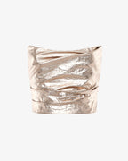 Top senza spalline in tessuto metallizzato
