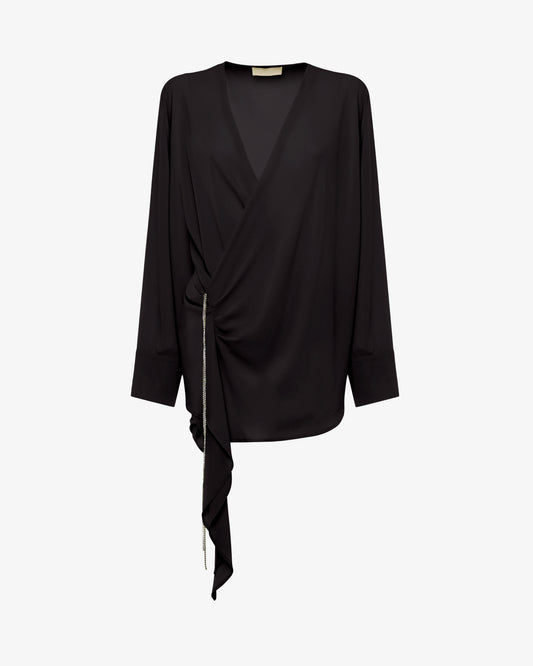 Blusa asimmetrica in georgette con scollo profondo e accessorio gioiello