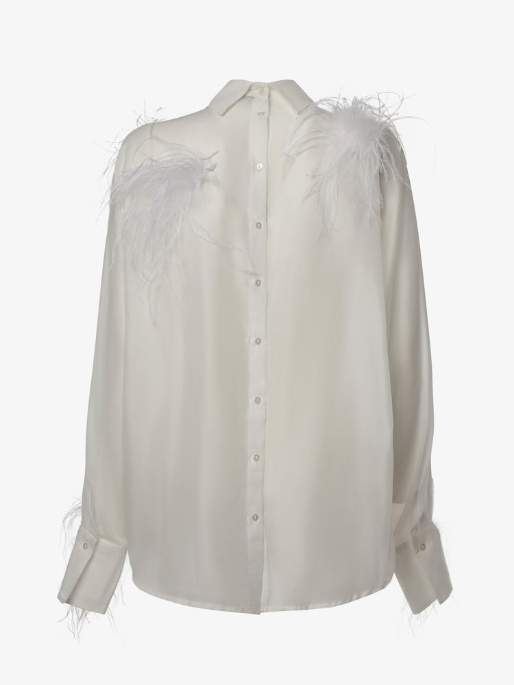 Blusa con bottoni sulla schiena e dettagli in piume