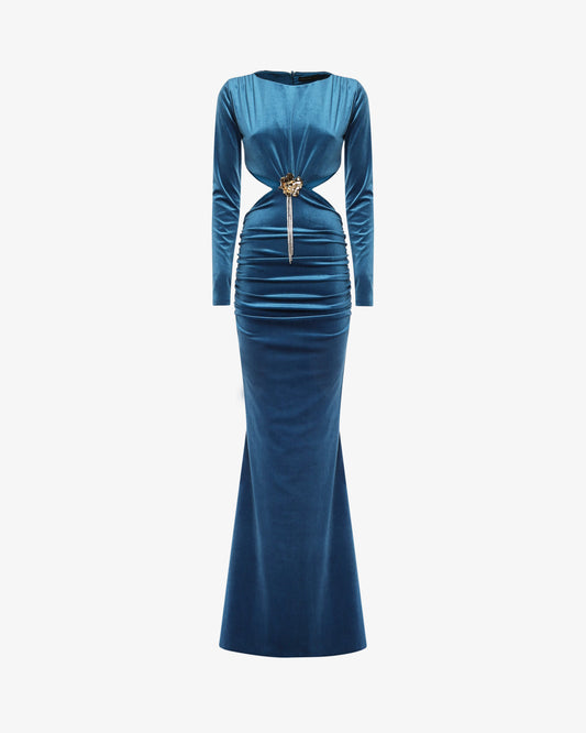 Abito lungo in velluto con cut out e decorazione metallica