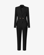Tailleur in crêpe con giacca doppiopetto e pantalone dritto