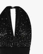 Tuta elegante in tessuto tecnico conbustino alto e corpetto di strass